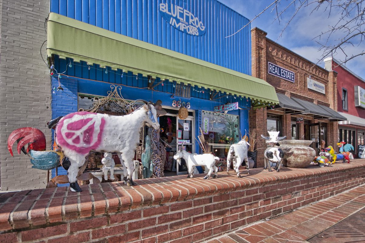 Blue Frog Imports on Main Street Woodstock GA — colorful independent storefronts